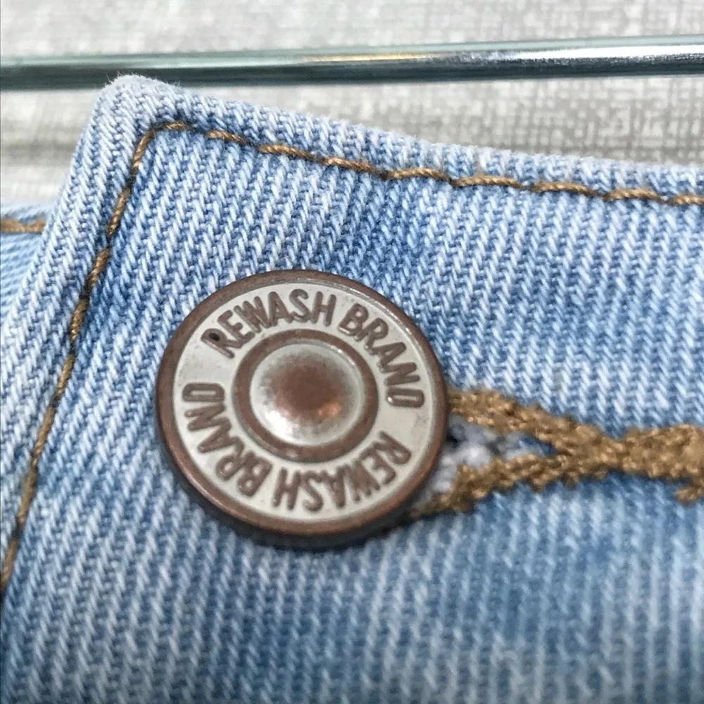 Rewash denim distressed